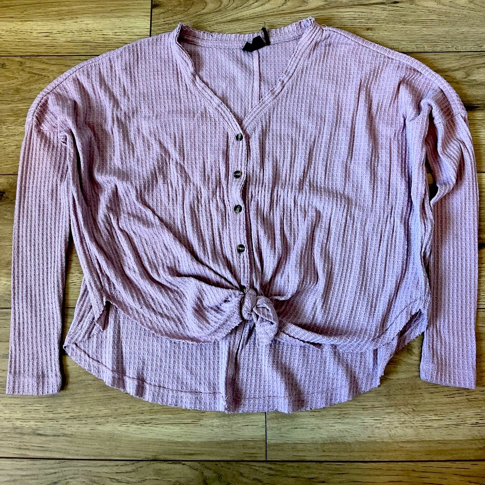 Pink sweater with buttons and a knot tie from PacSun
